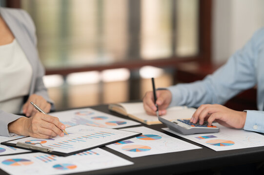Finance and accountant team working in office for accounting and preparation services for financial statements and cash flow with analyze data insight for finance and taxation planning.