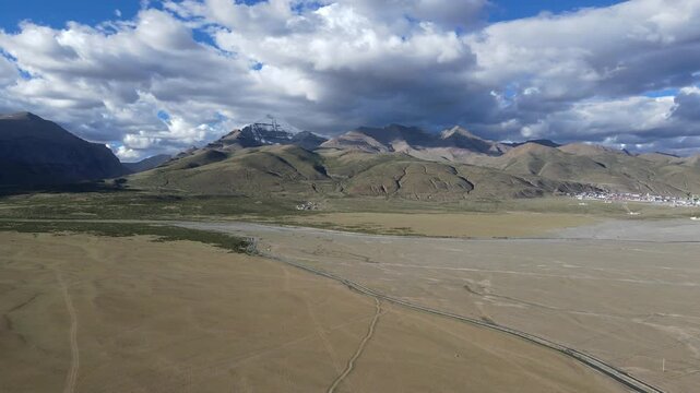 Cinematic Drone Push In Toward Mount Kailash (Gang Rinpoche) Over Vast Grassland, Tibetan Plateau, China