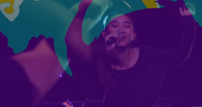Singing solo singer on stage in black top with mic, overlay sweeping, engaging fans' hands
