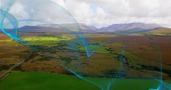 On playback cyan-green ribbon curling and undulating over aerial valley, visualizing data flow