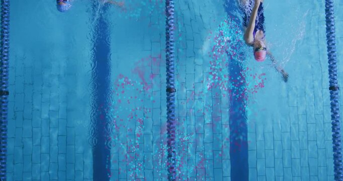 Lane particles appearing, expanding, fading; overhead following two swimmers training backstroke