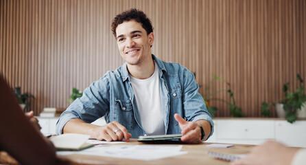 Meeting, tablet and man with client in creative agency, marketing campaign info or feedback for launch. Smile, tech or marketer with brand representative for planning, objectives or budget guidelines © peopleimages.com