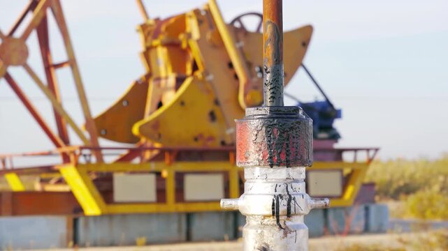 The change oil gasoline prices caused by war, petroleum crude oil drilling rigs derrick, pump jack machine oilfield, continuous extraction of fossil fuels global energy consumption power supply crisis