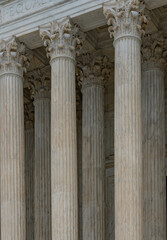 Fototapeta premium Columns Tall vertical texture background. Columns marble repetition symmetry. Columns architectural pattern design. Columns stone classical texture.
