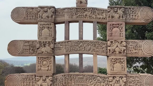 Close up zoom in shot of carved gateway from Sanchi Stupa, India