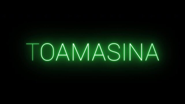 Flickering neon green glowing mahajanga sign animated on black background