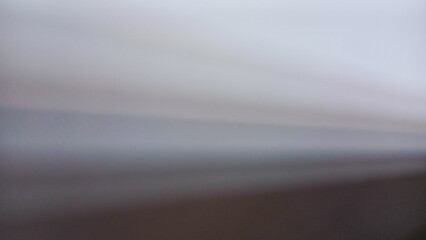 Fototapeta premium Soft abstract background with elegant diagonal light rays and smooth beige gradients for modern minimalist design