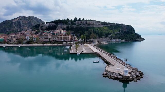 Beautiful aerial footage showing the historic city of nafplio and bourtzi castle in greece