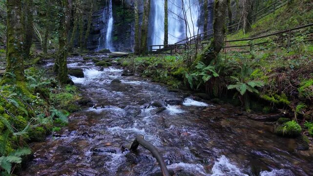 Scenic Seimeira de Vilagocende Waterfall In O Fito, A Fonsagrada, Spain - Drone Shot