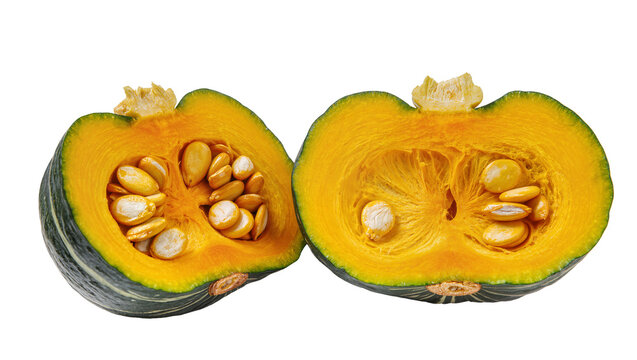Halved kabocha squash displaying vibrant orange flesh, and dark green rind with seeds