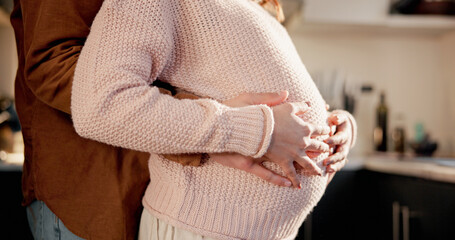 Hug, couple or pregnant woman with hands in kitchen of home, connection or tummy touch for family...