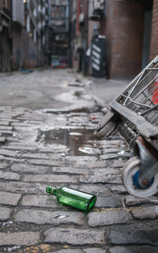 Urban Decay And Social Neglect In Glasgow Alleyway