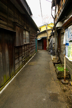 Nostalgic narrow alleyway in an old downtown district of Japan.
