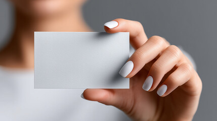 Obraz premium Person Holding Blank Shipping Label Sticker in Minimal Mockup Composition