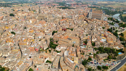 Fototapeta premium Aerial panorama view of the old town and city Toledo in Spain on a sunny summer morning