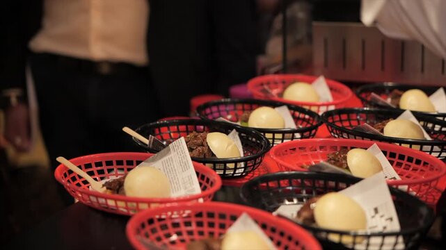 Close-up of a chef&rsquo;s hands preparing meat bao buns