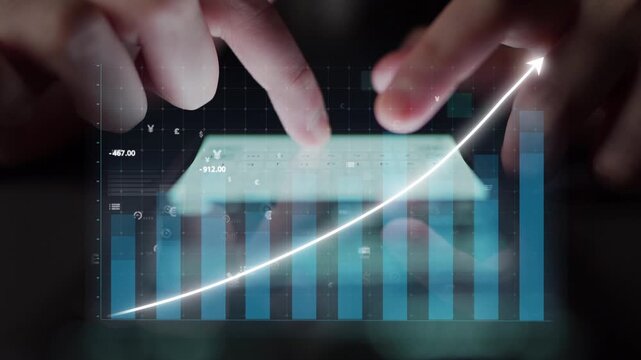 Close-up of hands interacting with a digital screen displaying financial data, emphasizing trends and growth in stock market performance through graphical representation. Copula