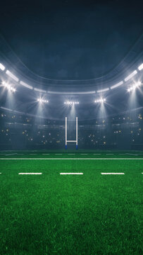 Rugby field at a sports stadium with glowing spotlights and fans ready for the upcoming night sporting event.