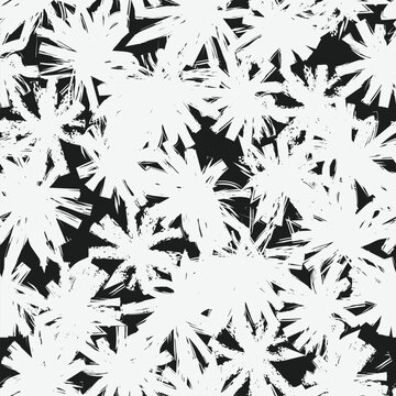 White stylized tropical flowers forming a seamless pattern against a black background, perfect for fabric prints, wrapping paper, or stylish decorative backgrounds
