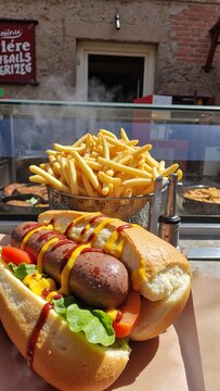 Hearty Belgian Mitraillette Sandwich with Fries and Sausages