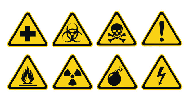 Warning signs display various hazardous symbols on triangular yellow boards