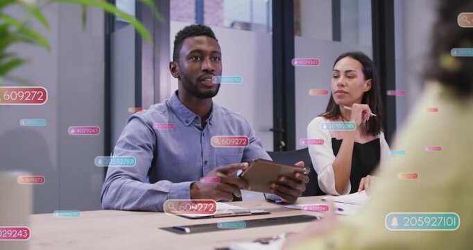 Man with tablet speaking in biz meet UI tags floating blurred reaching leading shaking sealing deal