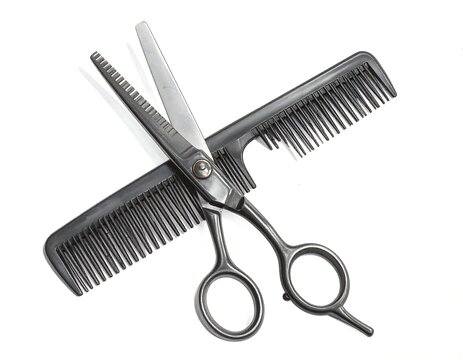 A pair of scissors and comb