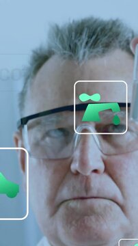 Vertical video: Lab tech holding vial up inspecting while icons drift over face assessing impact