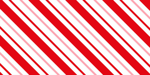 Obraz premium Candy cane Christmas background, peppermint diagonal stripes print seamless pattern