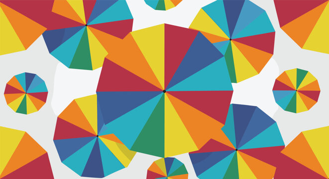 Top down view shows a dense and colorful pattern of multi colored umbrellas with various bright rainbow sections.