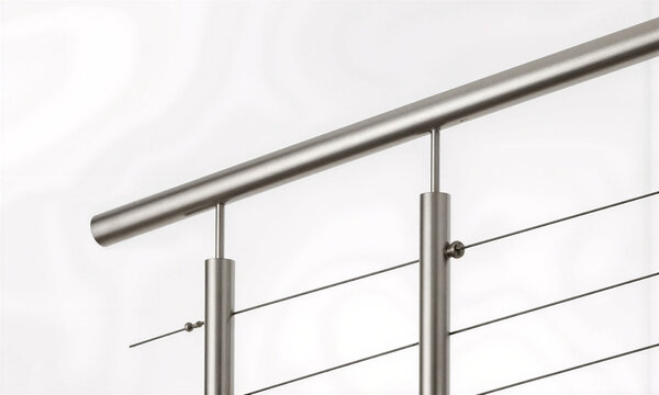 Cable railing stainless steel architectural detail shot of horizontal tension wires between minimal posts with copy space