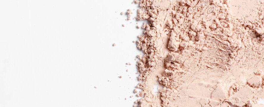 The texture of red cosmetic clay. The concept of cosmetic procedures or mud treatment. Copy space