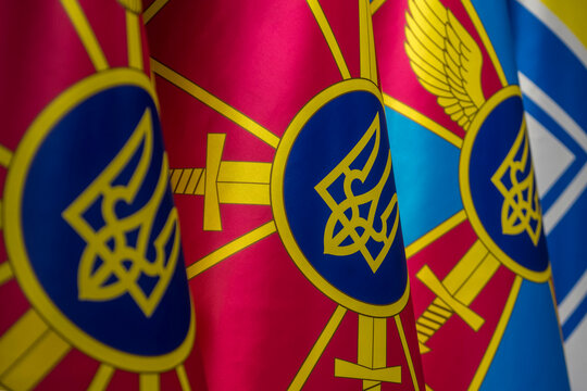 The flags of branches of the Armed Forces of Ukraine stand closely side by side in Kyiv, Ukraine,
