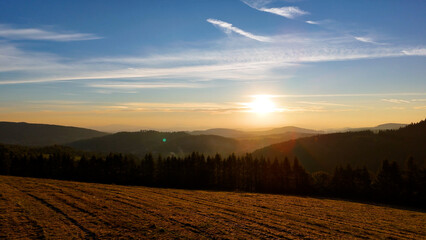 Drone flight over sunrise, mountains, forest, USA, America