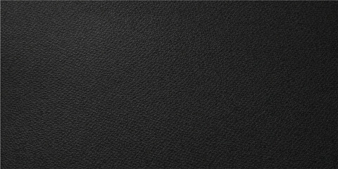 Fototapeta premium A subtle textured black backdrop, perfect for conveying elegance, mystery, and a touch of sophistication, creating a striking canvas for various design applications.