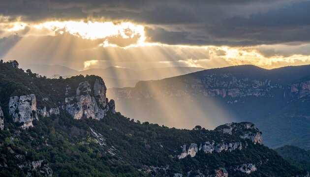 Dramatic sunlight over mountain peaks