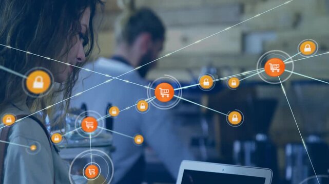 Animation of network of connections with trolley icons over caucasian woman with tablet in cafe