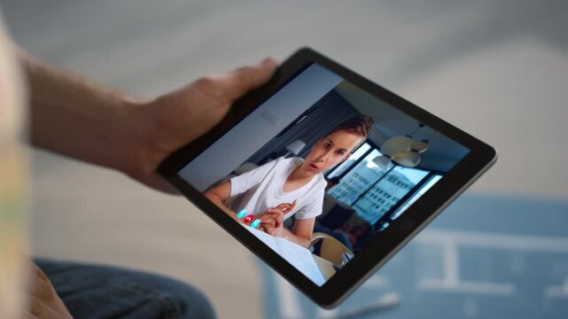 Kid calling tablet online talking unknown father street closeup. Man holding tab