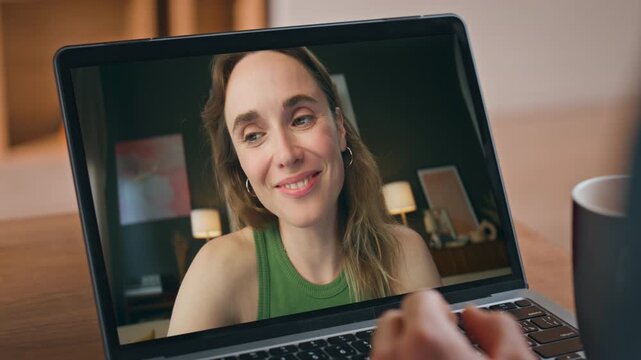 Cheerful girl flirting videochat laptop at flat closeup. Couple talking online