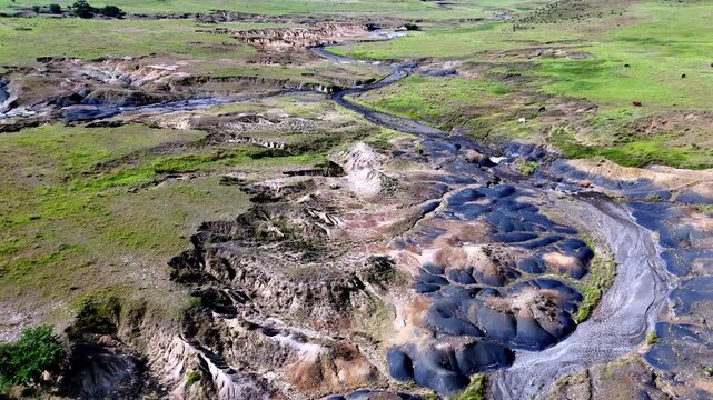 Aerial view of badly eroded farmland from overgrazing cattle