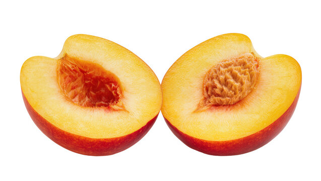 Ripe juicy halved peach with pit and vibrant orange flesh