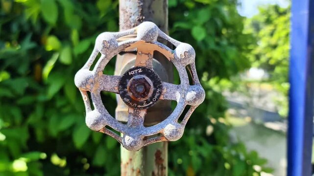 Gresik, Indonesia- 5 April 2026: Close up of Industrial Metal Gate Valve on Main Gas Pipe in Outdoor Industrial Facility