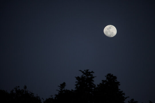 Full moon over sea in Ngapali, Myanmar.