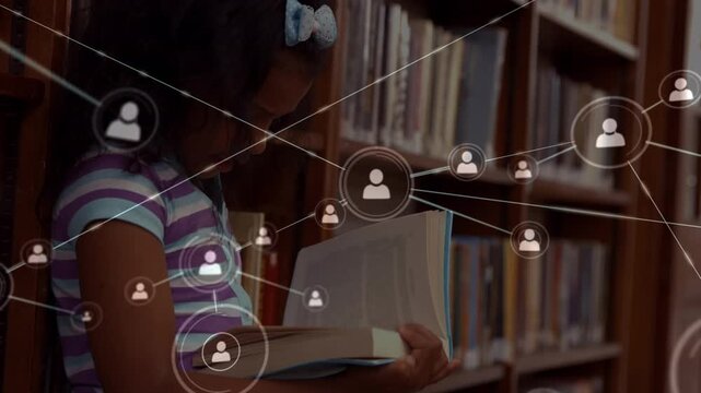 Animation of network of connections with icons over schoolgirl reading book in library