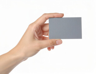 Obraz premium Hand holding a blank business card on white background, clean minimal mockup with copy space for branding and identity design