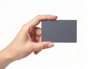 Obraz premium Hand holding a blank business card on white background, clean minimal mockup with copy space for branding and identity design