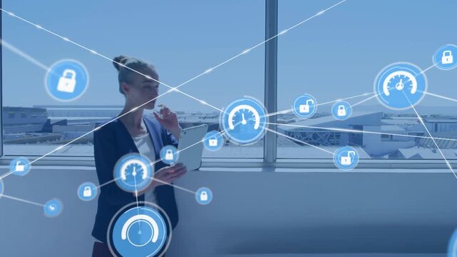Animation of connected speedometer and padlock icons over caucasian businesswoman using tablet
