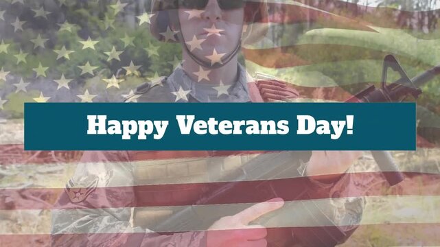 The flag of the united states of america waving over a caucasian soldier holding a gun