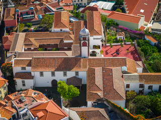 Convent of Santa Clara, Funchal, Madeira, a historic monastery with red tiled roofs and a peaceful inner courtyard in the city center.