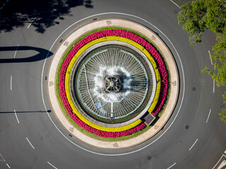 Chafariz da Rotunda do Infante, Funchal, a circular fountain by António Duarte with colorful flower rings and geometric urban design.